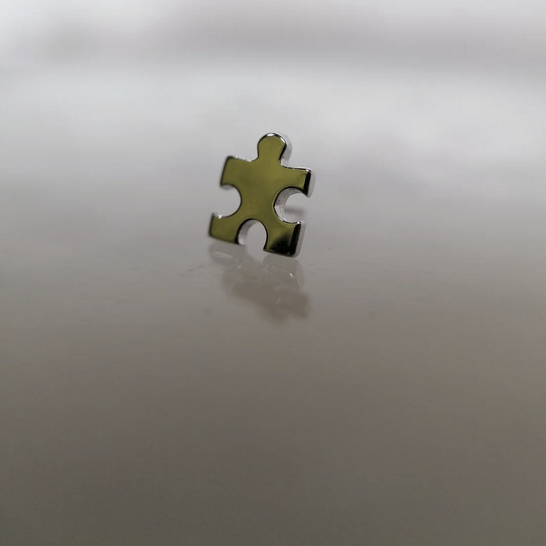 Gold Puzzle Piece from Junipurr